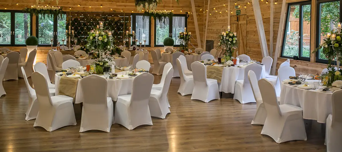 Chairs with white covers in the banquet hall